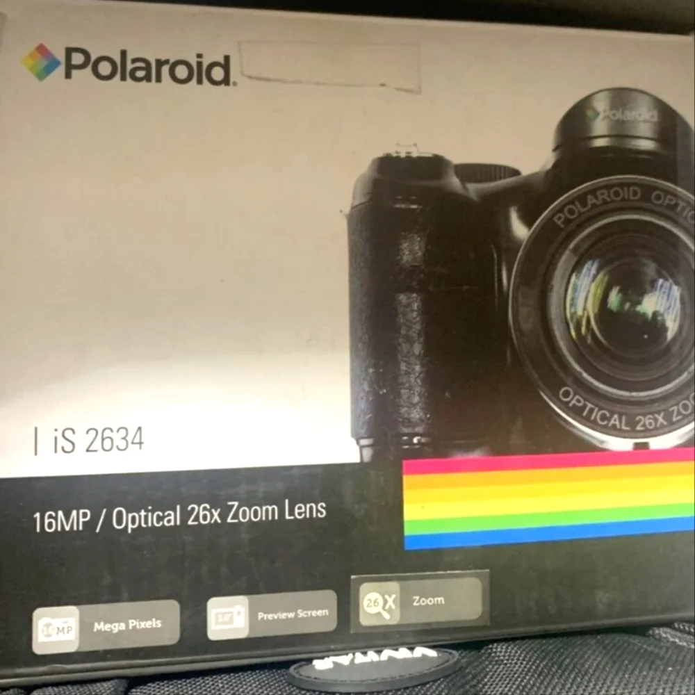 NIB Poloroid Optics iS 2634 camera in Red